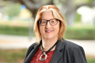Portrait of Dean Alexandra Minna Stern outdoors at UCLA