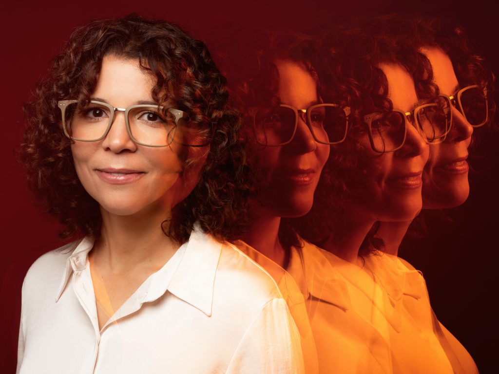 Portrait of Ananda Lima with additional reflected portraits