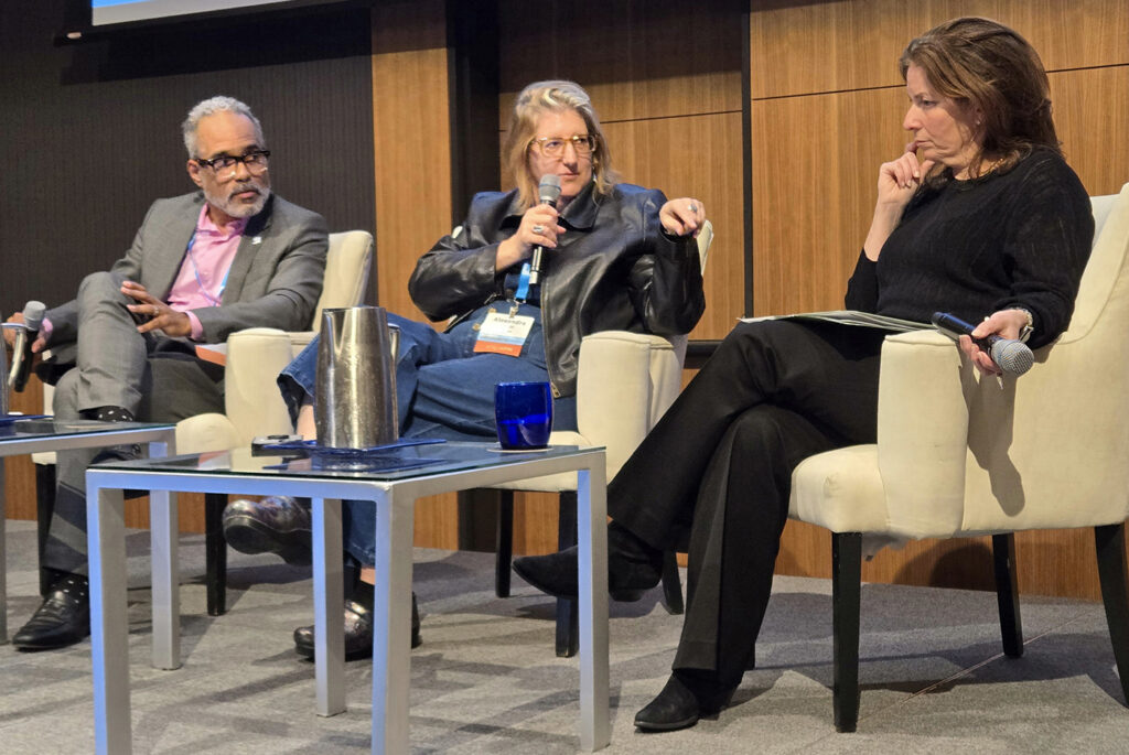 Daryle Williams, Alexandra Minna Stern and Sara Guyer seated on stage at UC Systemwide Academic Congress