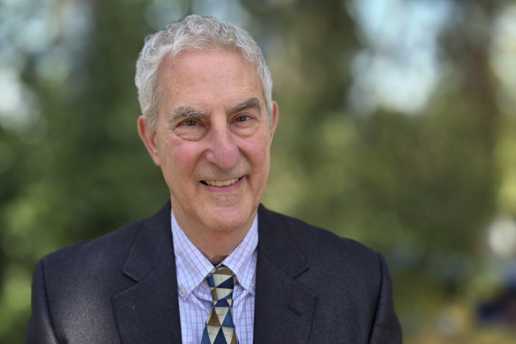 Portrait of David Blank with trees in the background